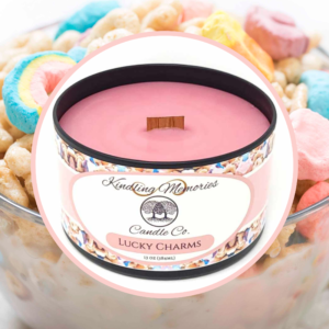 Pink candle labeled "Lucky Charms" on cereal.