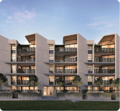Modern apartment building at sunset.