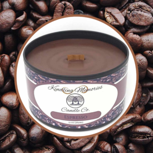 Espresso-scented candle on coffee beans background.