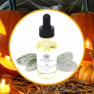 Pumpkin-themed oil bottle with candlelit background.