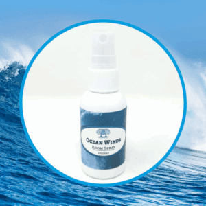 Room spray bottle with ocean wave background.