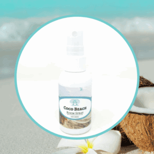 Coco Beach room spray with coconut background.