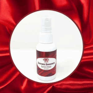 Room spray bottle on red satin background.