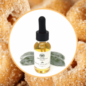 Lemon sugar oil with sugared donuts background.