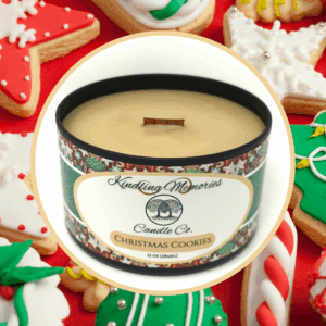 Candle surrounded by decorated Christmas cookies.